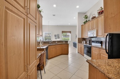 SITUATED ON A PREMIUM CORNER LOT THIS RESIDENCE OFFERS A BRIGHT - photo 29