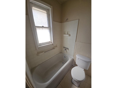 Prime Location with Exceptional Potential! This 3-bedroom - photo 34