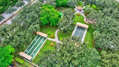 SITUATED ON A PREMIUM CORNER LOT THIS RESIDENCE OFFERS A BRIGHT - photo 58