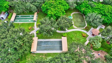 SITUATED ON A PREMIUM CORNER LOT THIS RESIDENCE OFFERS A BRIGHT - photo 59