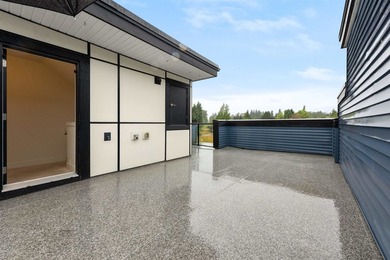 Discover over 2,000 sq. ft. of contemporary living in this - photo 24
