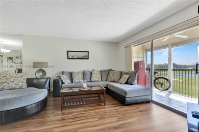 Set along the golf course in Buckingham East at Century Village - photo 3