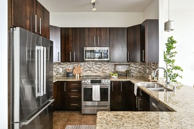 Experience elevated city living in this beautifully updated 2BR - photo 9