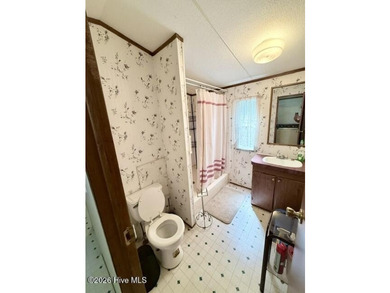 Singlewide home sitting on 1.45 +/- unrestricted acres! Nestled - photo 12
