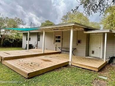 Charming 3BR/1BA concrete block home with major updates and a - photo 12