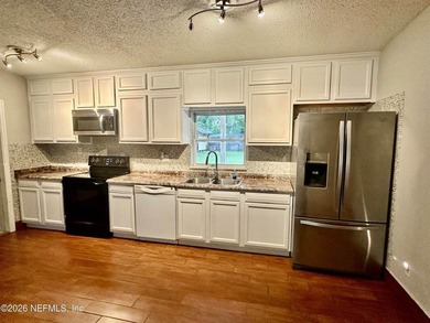 Charming 3BR/1BA concrete block home with major updates and a - photo 13