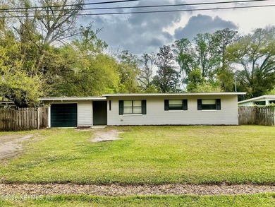 Charming 3BR/1BA concrete block home with major updates and a - photo 18