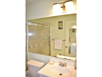 Very nicely kept condominium next to one of the swimming pools - photo 11
