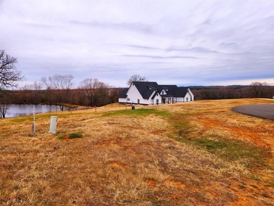 This beautiful 1+ acre hilltop lot sits at the end of a quiet - photo 5