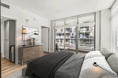 Welcome to this beautifully refreshed 8th-floor corner residence - photo 11