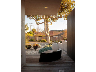 Welcome to a striking architectural residence in the highly - photo 7
