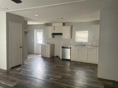Own your own home in a quiet, well-maintained neighborhood! This - photo 2