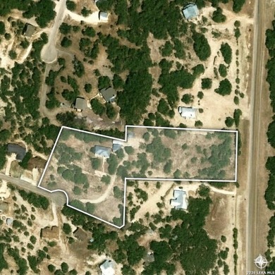 Gated Hill Country property on nearly 5 acres in the highly - photo 2