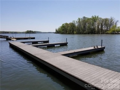 This Badin Lake area lot is located in the prestigious gated - photo 8