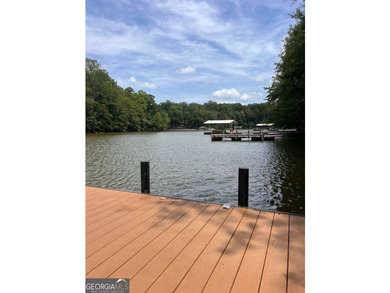 Located on a .46-acre lakefront lot in Martin, GA, 410 Lakeside - photo 9