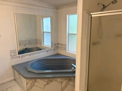 Don't miss this beautifully updated **1999 Double-Wide** - photo 14