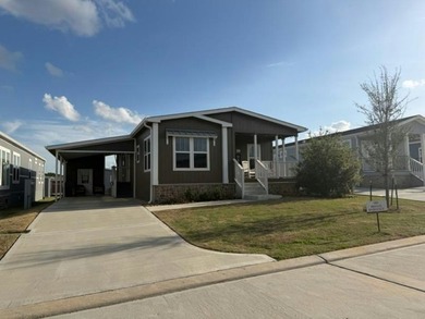 Discover RockRose Ranch, a Land Leased Manufactured Home - photo 2