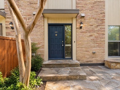 Welcome to this beautifully updated condo tucked away in the - photo 2
