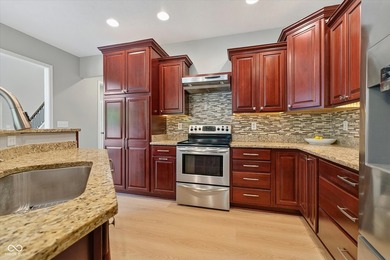 Tucked away on a breathtaking .74-acre wooded homesite in - photo 12