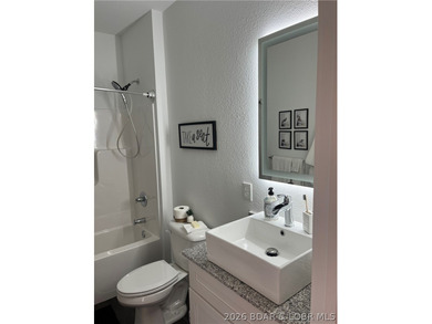 NEW CONSTRUCTION WITH A BOAT SLIP! You heard it right. Two *must - photo 15