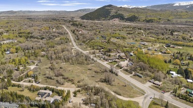 Set on 5 pristine acres in Jackson Hole, WY 83001 this - photo 16