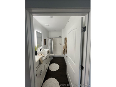 NEW CONSTRUCTION WITH A BOAT SLIP! You heard it right. Two *must - photo 12