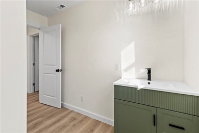 Step into this fully renovated 3-bedroom, 2-bath home located - photo 25