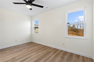 Step into this fully renovated 3-bedroom, 2-bath home located - photo 27
