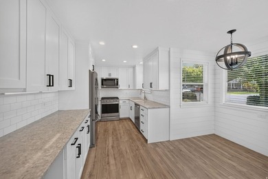 Completely renovated and move-in ready, this beautifully updated - photo 6