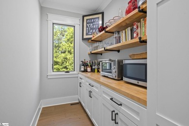 Experience the pinnacle of luxury lakefront living in this - photo 12