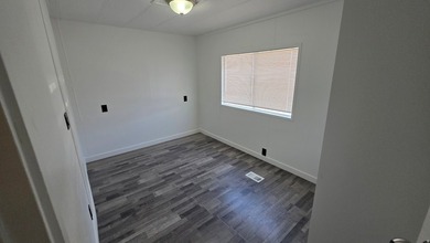 Welcome home! 4 bedroom 2 bath home in most desired mobile home - photo 12