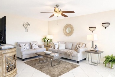 Immaculate 2-bedroom, 1.5-bath condo with a stunning lake view - photo 2