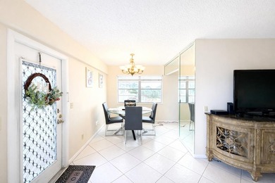 Immaculate 2-bedroom, 1.5-bath condo with a stunning lake view - photo 3
