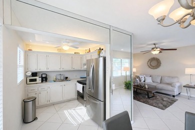 Immaculate 2-bedroom, 1.5-bath condo with a stunning lake view - photo 6