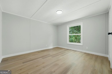 Fully remodeled and move-in ready, this Acworth home offers the - photo 16