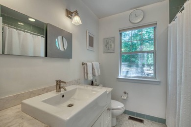 Set on 1.4 exquisitely landscaped acres in coveted East Hampton - photo 17