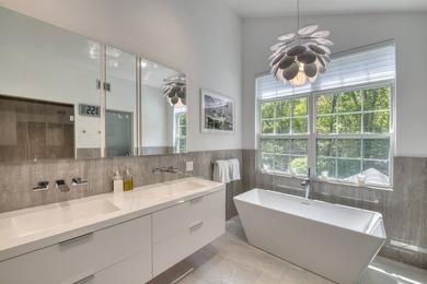 Set on 1.4 exquisitely landscaped acres in coveted East Hampton - photo 18