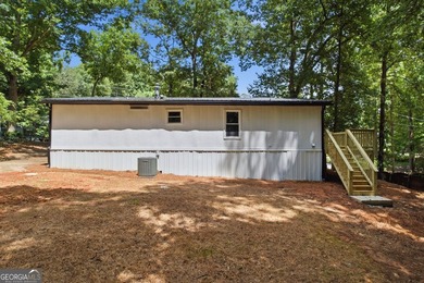 Fully remodeled and move-in ready, this Acworth home offers the - photo 19