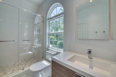 Set on 1.4 exquisitely landscaped acres in coveted East Hampton - photo 23