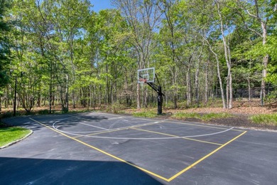 Set on 1.4 exquisitely landscaped acres in coveted East Hampton - photo 24