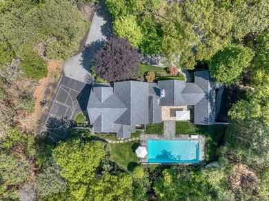 Set on 1.4 exquisitely landscaped acres in coveted East Hampton - photo 26