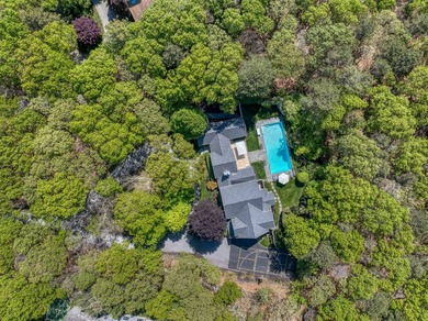 Set on 1.4 exquisitely landscaped acres in coveted East Hampton - photo 27