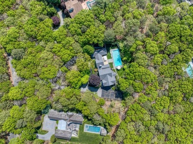 Set on 1.4 exquisitely landscaped acres in coveted East Hampton - photo 28