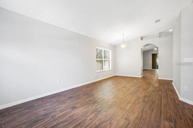 Beautifully renovated 4-bedroom, 2-bath home in the guard-gated - photo 3