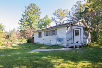 Crooked River - Emmet County Home For Sale in Alanson Michigan