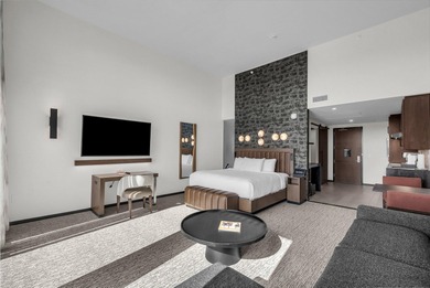 Enjoy incredible views of the lava fields and Hole 9 at Black