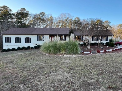 Spacious lake home on 2.9 acre lot with boat dock in place and - Lake Home For Sale in Manson, North Carolina