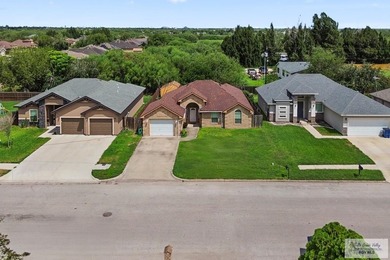 Welcome to this beautifully maintained 4-bedroom, 2-bathroom