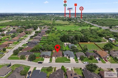 Welcome to this beautifully maintained 4-bedroom, 2-bathroom