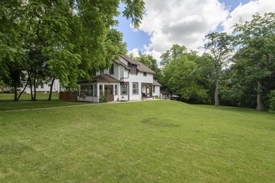 This stunning home is located on a hill overlooking Pewaukee - photo 2
